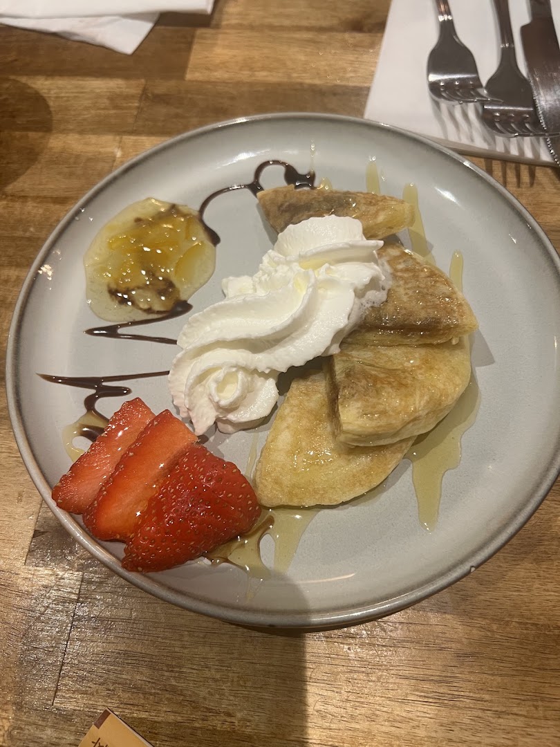 Un dessert servi dans une coupe chez Busan
